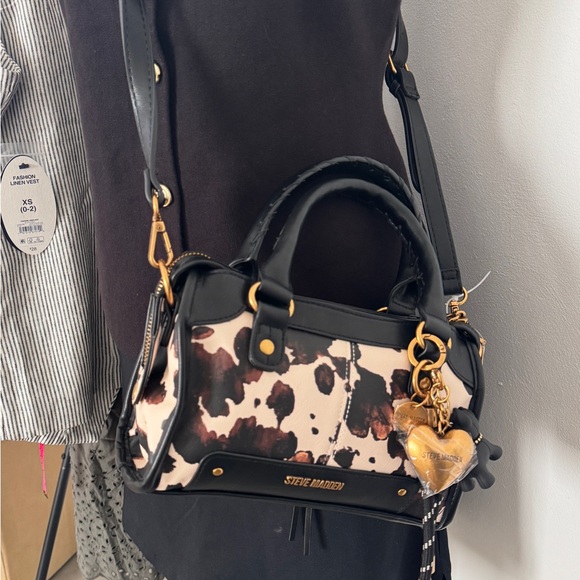Steve Madden Handbags - Viral Steve Madden Cow Print Faux Leather Crossbody with Bag Charms - NWT